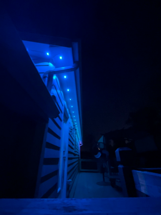 Still image showing outdoor permanent, Govee lighting installaltion by Graceful Grounds.